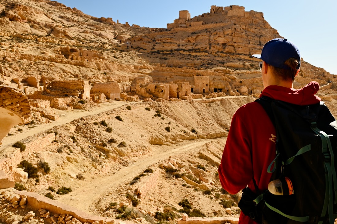 Noctilight Schutzhülle mit der Petzl Tikka Core am Rucksack